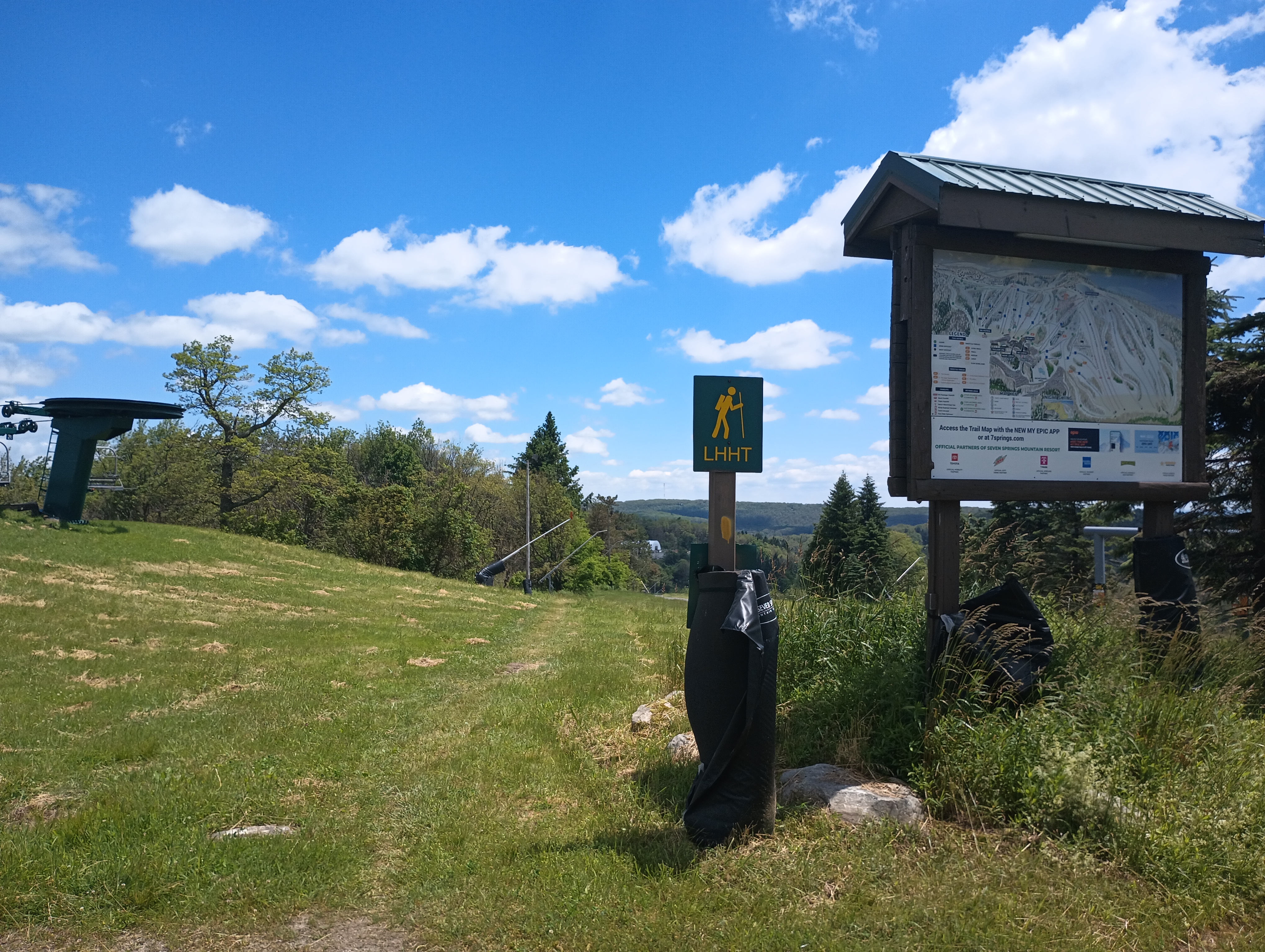 Signs and yellow blazes mark the LHHT as it goes across the ski resort.